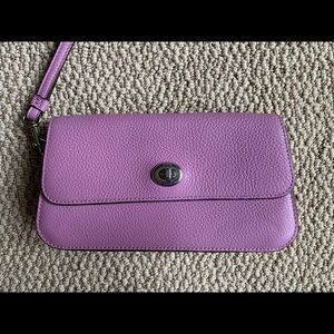 Coach pebbled purple clutch wristlet